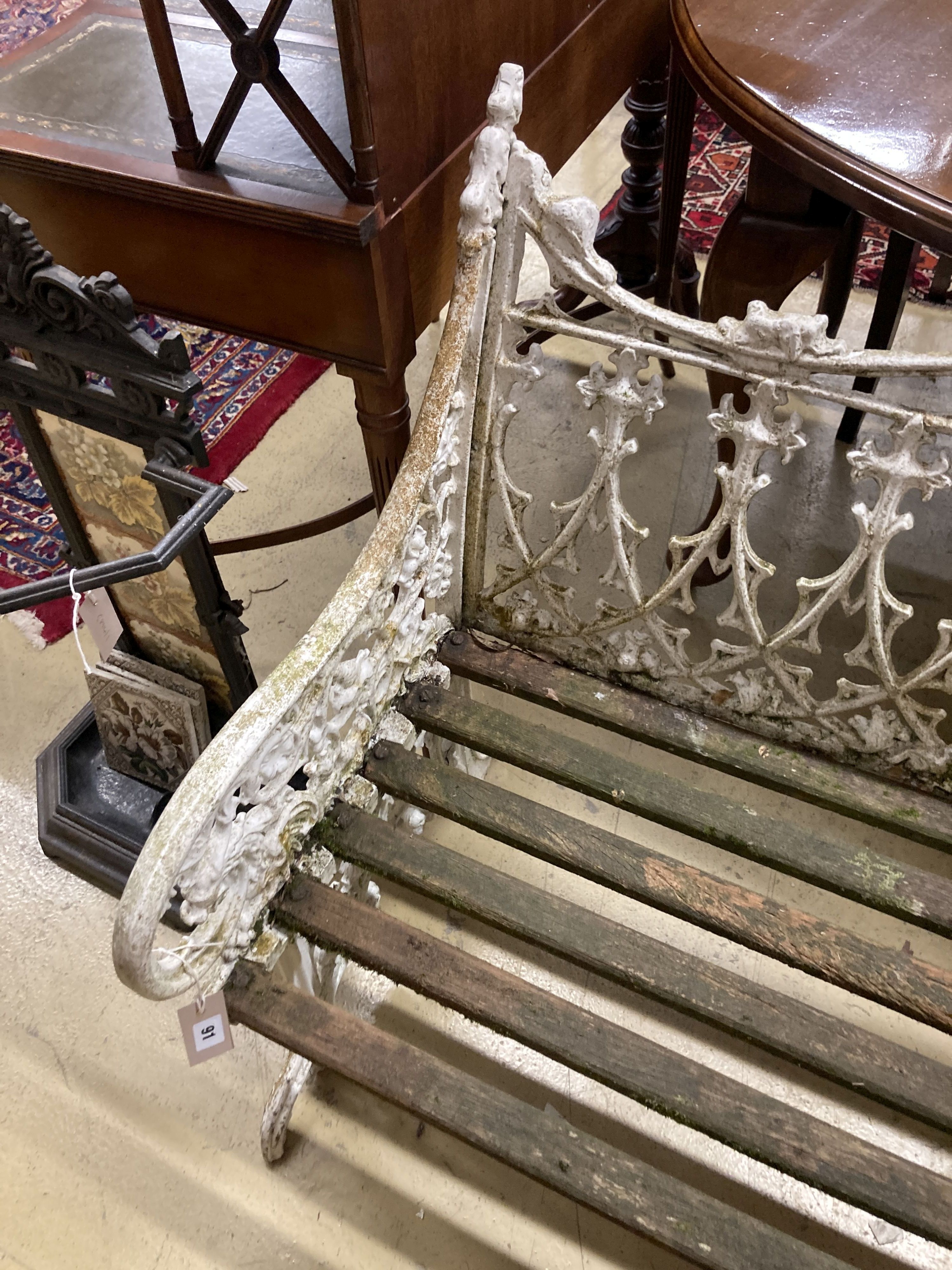 A Victorian style Coalbrookdale design painted cast metal garden bench with slatted wood seat, length 150cm, depth 55cm, height 100cm